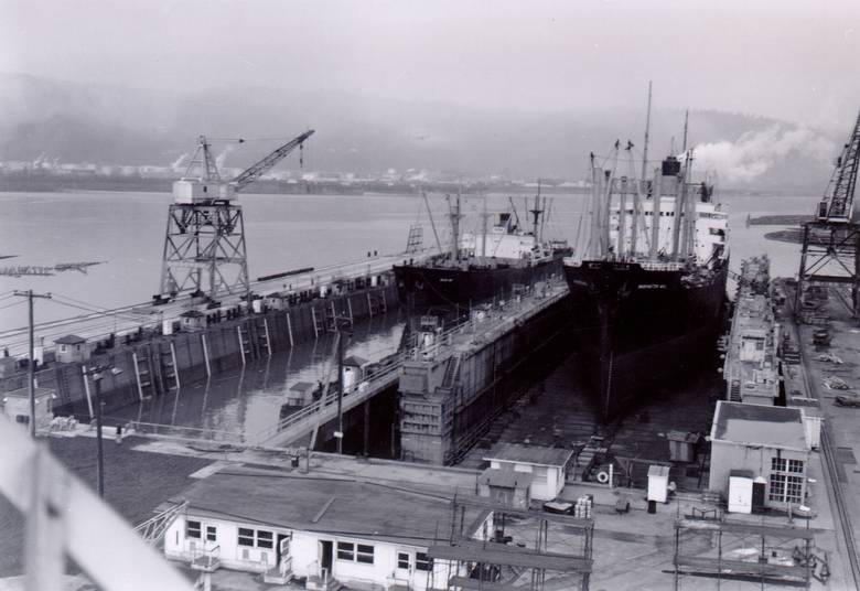 Ship entering the Portland drydock.  / Drydock sunk to allow ship to enter